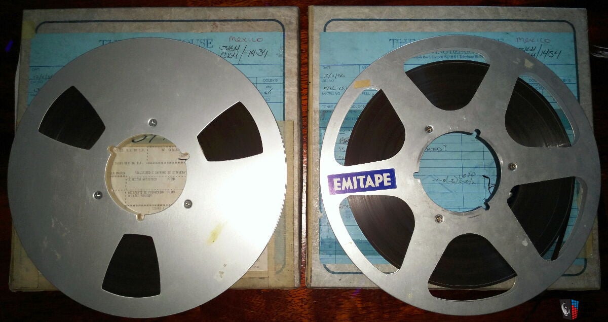 https://img.usaudiomart.com/uploads/large/1934885-931d0a9e-queen-live-magic-reel-to-reel-tape-2tr-15-ips-master-tape-original-emi.jpg